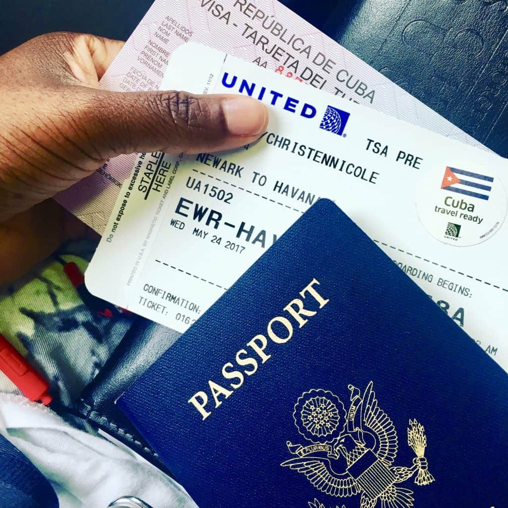 Hand holding passport