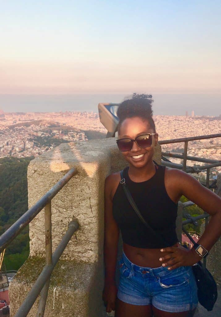 Woman atop mount tibidabo