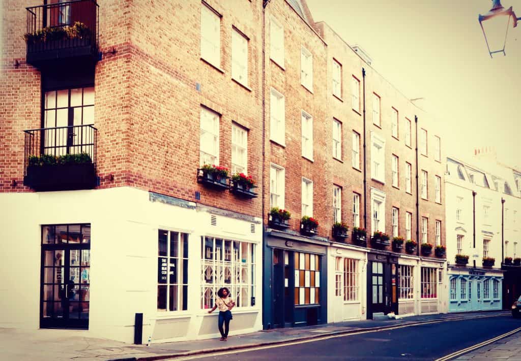 Woman standing on street near Covent Garden