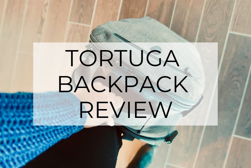 tortuga backpack in hand