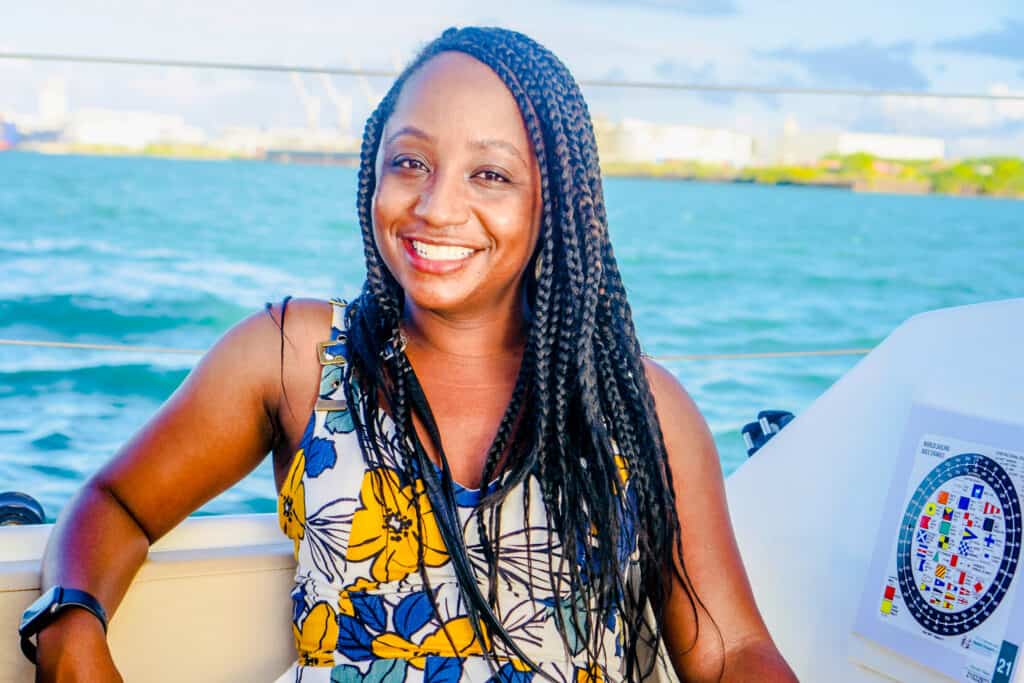 Woman sailing in a boat around Old San Juan