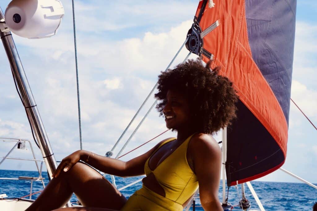 Black woman on Catamaran in Barcelona