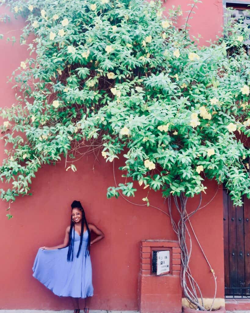 Woman under tree in Cartagena Colombia