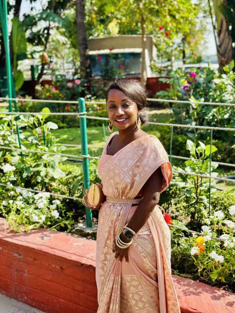 Black woman wearing Saree